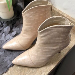 Stiletto boots never been worn.